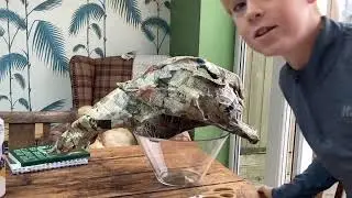 I made a paper mache green goblin helmet