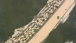 Freak snowstorm, cold snap paralyze US South