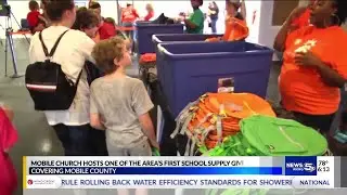 Mobile church hosts one of the area's first school supply giveaways