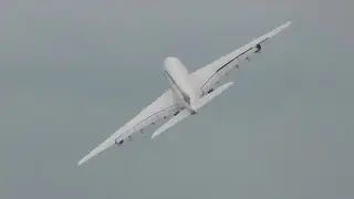 Extrem waving Lufthansa Airbus A380 D-AIMJ take off for delivery at Hamburg Finkenwerder