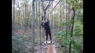 Jessica going across on a Pull Swing - at Tree Tops Adventure Course