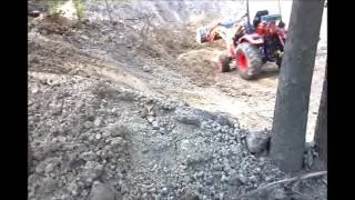 Digging a pond with a Compact Tractor - Kioti CK20s