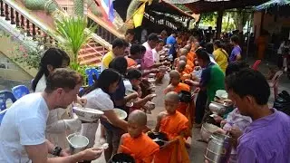 Songkran Alms Offering to Monks at Rural Thai Temple (Tak Baht)