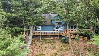 9367 N LORRAINE DRIVE, PENTWATER, MI Presented by Sue Payne.