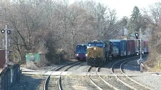 NJT RiverLINE LRV Passing CSX #3418 at Cove Road.