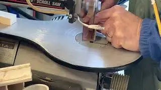 Scroll saw cutting 1/8&rdquo; angle iron.