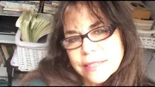 A Woman Writes the Unicorn Butterfly