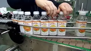 Pressure Sensitive wraparound on square bottle 1