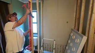 Homestead mobile home bathtub to walk in shower remodel pt8 building the next wall /kitchen cabinets