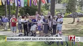 People march in Watts Hospital-Hillandale Parade, oldest 4th of July celebration in Durham