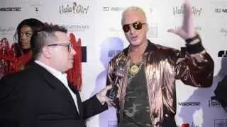 Pop Artist Kuba Ka loves his Versace  at For the Stars Fashion House opening