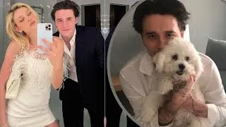 Brooklyn Beckham poses with his pet pooch as he settles into married life