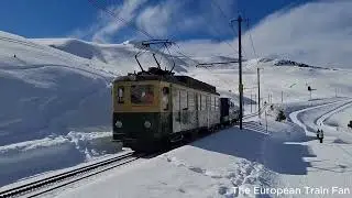 Wengernalpbahn BDeh 4/4 118 passes with little freight train