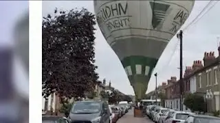 Hot air balloon makes emergency landing in middle of UK neighborhood