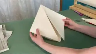 *Self Programming Origami - Mandi shows how to fold a samurai hat.