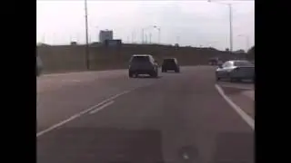 STUPID DRIVER ALERT: WOMAN MAKES UNSAFE MERGE!