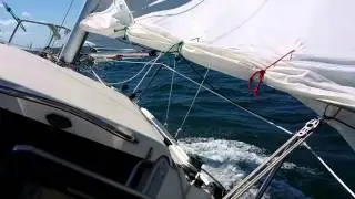 Sailing in high winds rough seas and sunny skies