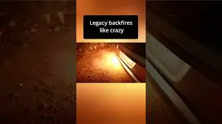 Subaru Legacy shooting huge flames
