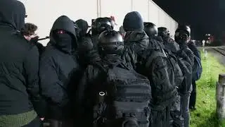 Swarming!   Black bloc protesters surround a conservative influencer at Portland ICE protests.