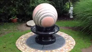 turning and rotating a granite ball
