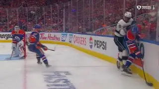 Quinton Byfield with a crushing hit on Ty Emberson