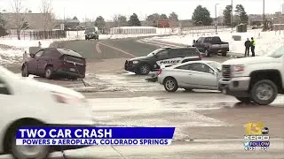 Crash blocks traffic at Powers Boulevard intersection