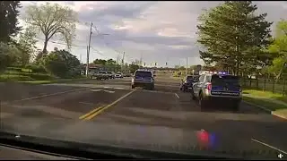 VIDEO: Town of Tonawanda Police officer sprints down Delaware Avenue to stop runaway vehicle