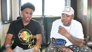 Power 103.5's Miles Perry talks with hip-hop legend Twista at the  Juneteenth