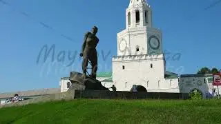 Kazan, Russia. Monument to M. Jalil. Kremlin walls. Spasskaya Tower of the Kazan Kremlin