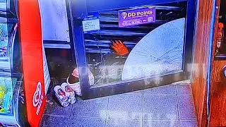 Durham shopkeeper traps KNIFEPOINT ROBBER under roller shutter until police arrive | Caught on CCTV