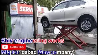 Car washing scissors lift/car washing lift shiv engineering works Faridabad ph.7240534502,9953622324