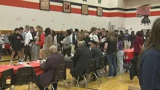Hundreds of United Township students explore potential future jobs at career fair