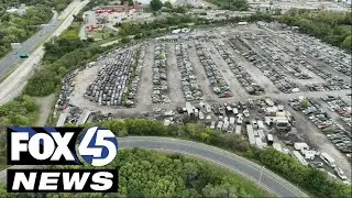 Drone video shows graveyard of cars at Baltimore City impound lot