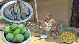 SHOL FISH curry with MANGO FRUIT cooking & eating by old tribal widow Grandmother||Village kitchen