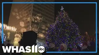 Christmas tree lit in Jefferson Square Park during Light Up Louisville