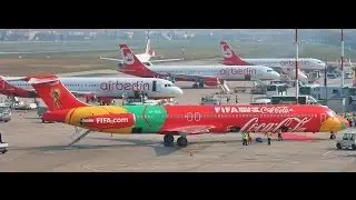 Danish Air Transport McDonnell Douglas MD-83 OY-RUE mit Wasserfontäne am Flughafen Berlin Tegel