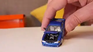 Ford Mustang Cobra ze stajni Racing Champions Mint