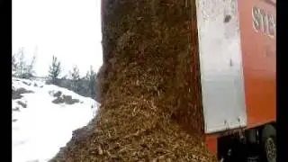 Chip truck unloading (walking floor trailer)