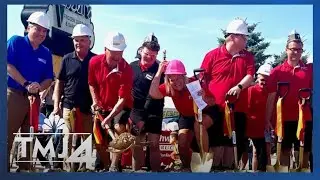 The Oscar's Frozen Custard family breaks ground with a shovel and a scoop after devastating fire