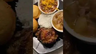 Neck bones and potatoes, chili beans, jerk chicken thighs, white rice and cornbread muffins.