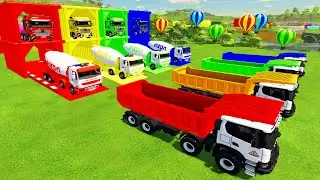 Гараж в ярких красках - красочный самосвал Scania, бетоносмеситель Renault, перевозимый грузовиком.