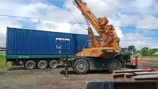 Kobelco RK160-2 Rough Terrain Crane Installing Container
