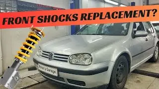 Замена переднего амортизатора, пружины и опоры стойки VW Golf 4