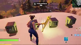 Place alien light communication device on mountain tops - Fortnite
