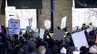 Protesters outside Minneapolis hotel where ICE agents are believed to be staying