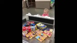 Lydia bagging groceries