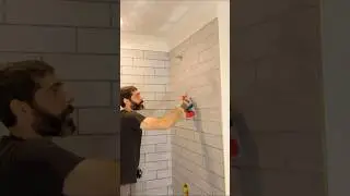 How to Grout Shower Walls - #shorts #homerepairtutor