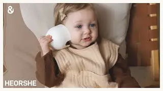 Adorable Baby Enjoys HEORSHE Teether: Safe & Soothing Relief for Teething