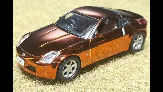 Обзор модели автомобиля Nissan Fairlady Z 350Z Z33 в масштабе 1/64 от Kyosho, представленной на 4...
