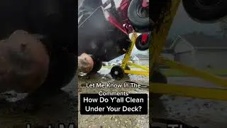 How do I clean my mower deck